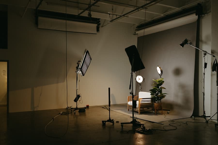 A wide studio floor with stands and lights in position